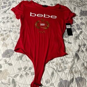 NWT Bebe medium one piece bodysuit